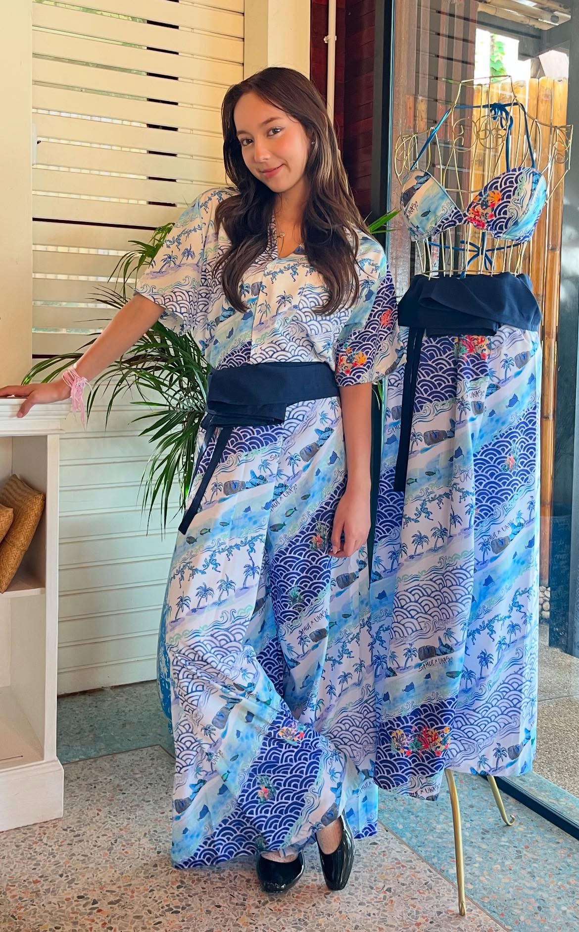 The Blue Spice branded beachwear — resort-print dresses and swimwear