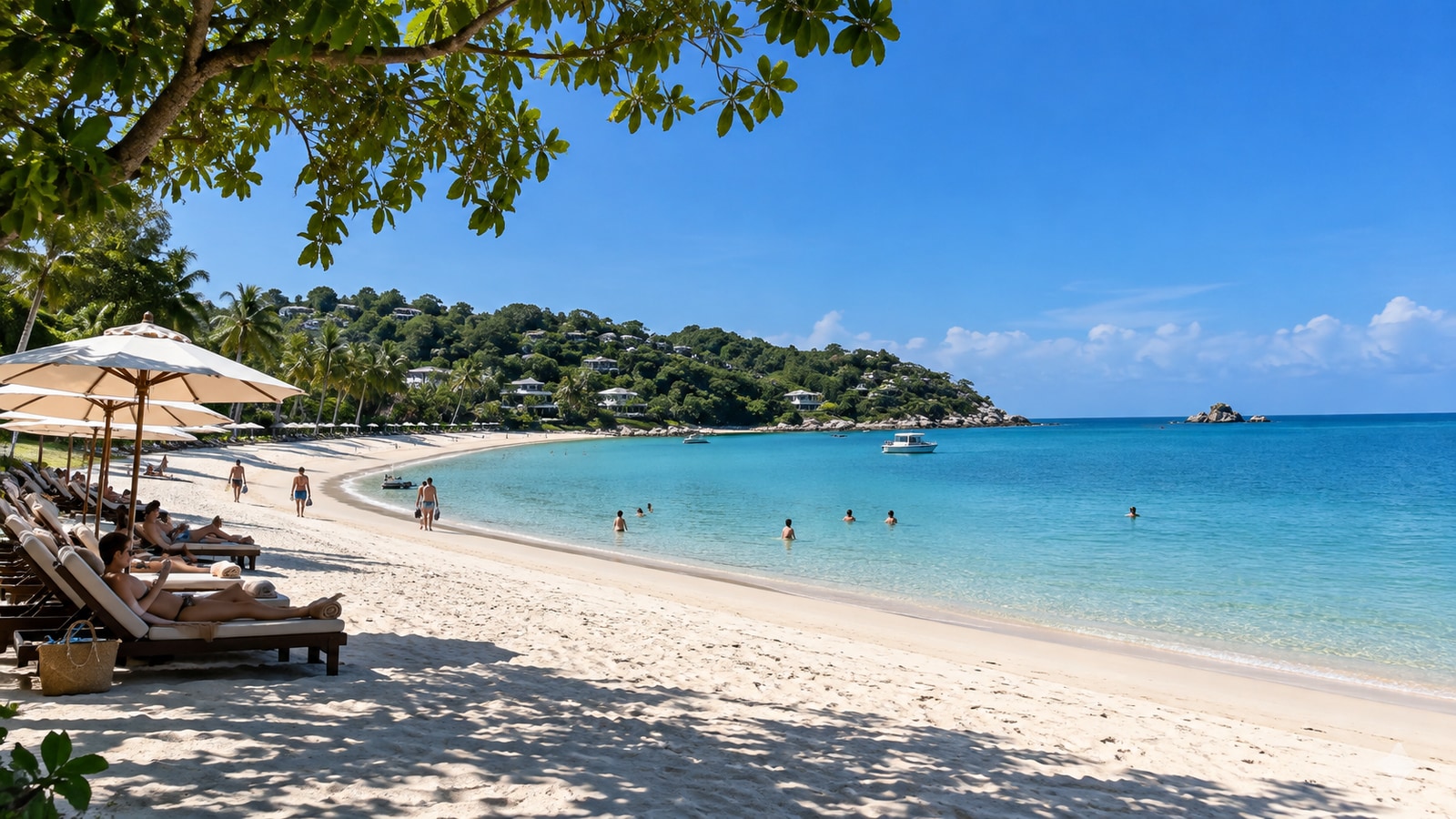 Sandy shoreline and calm turquoise water at Choeng Mon Bay